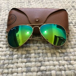 Ray Ban green mirrored sunglasses.